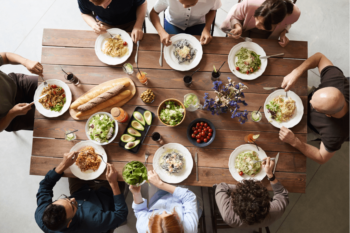 Overhead view of a group of people eating.