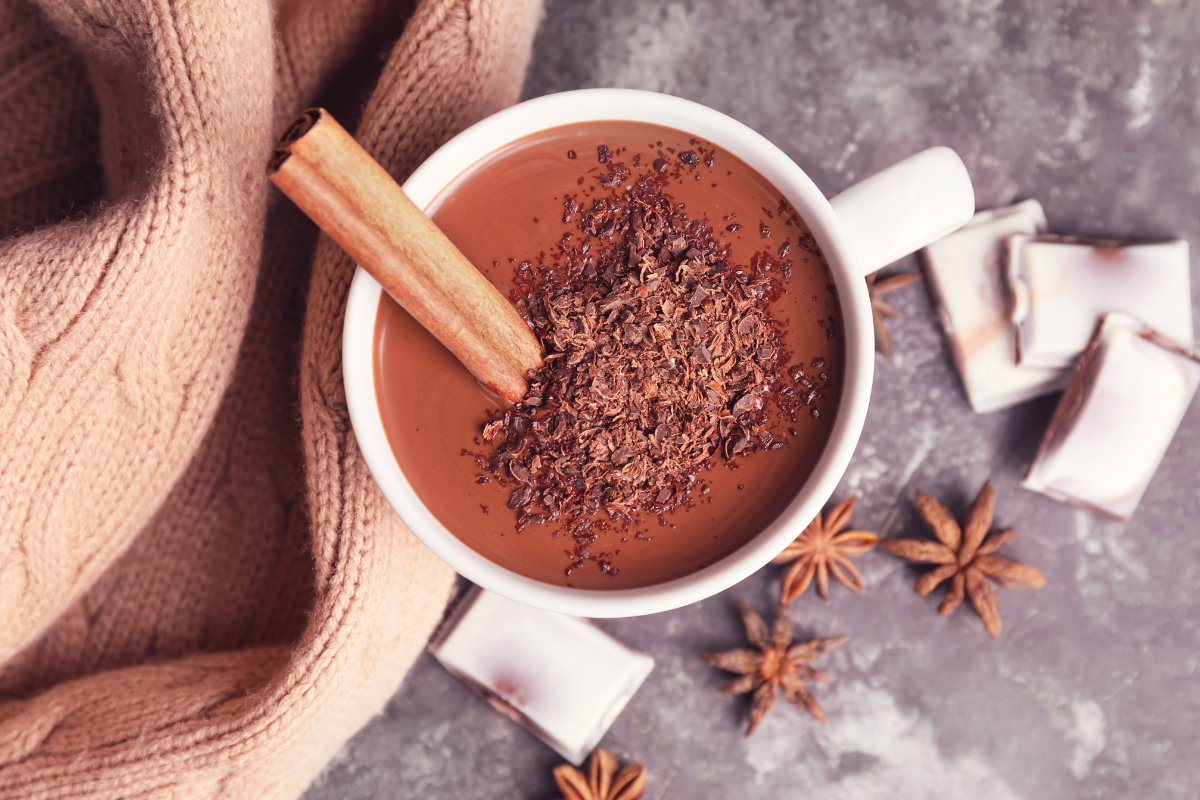 Creamy hot chocolate with cinnamon and chocolate shavings.